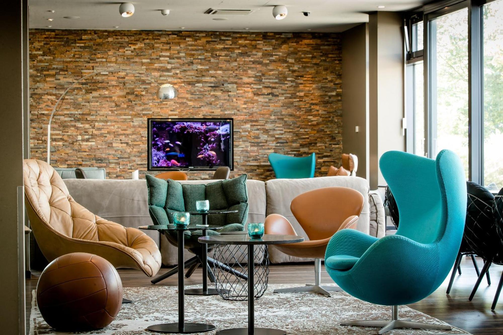 Motel One Muenchen-Garching Гархинг-бай-Мюнхен Экстерьер фото