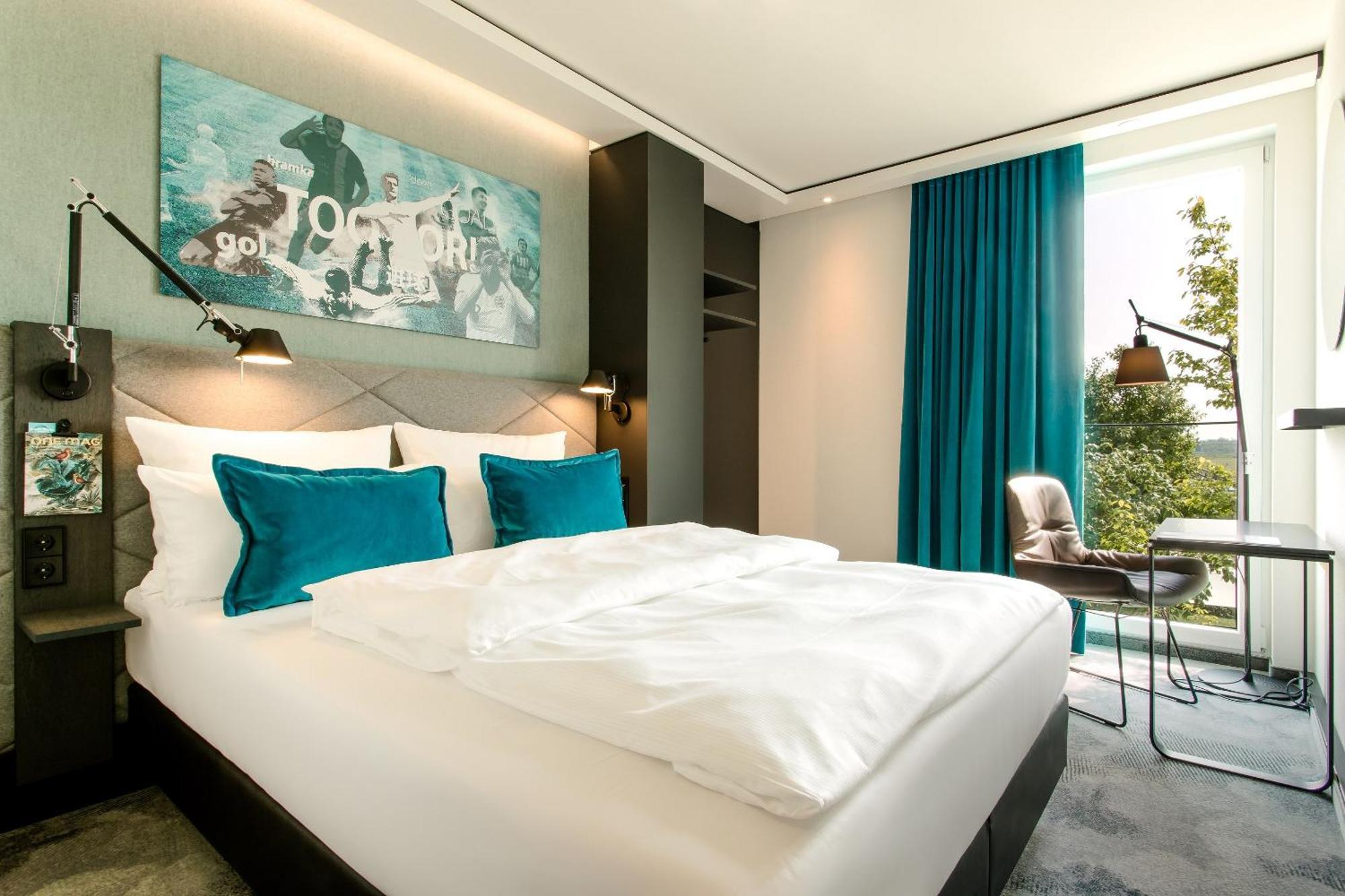 Motel One Muenchen-Garching Гархинг-бай-Мюнхен Экстерьер фото